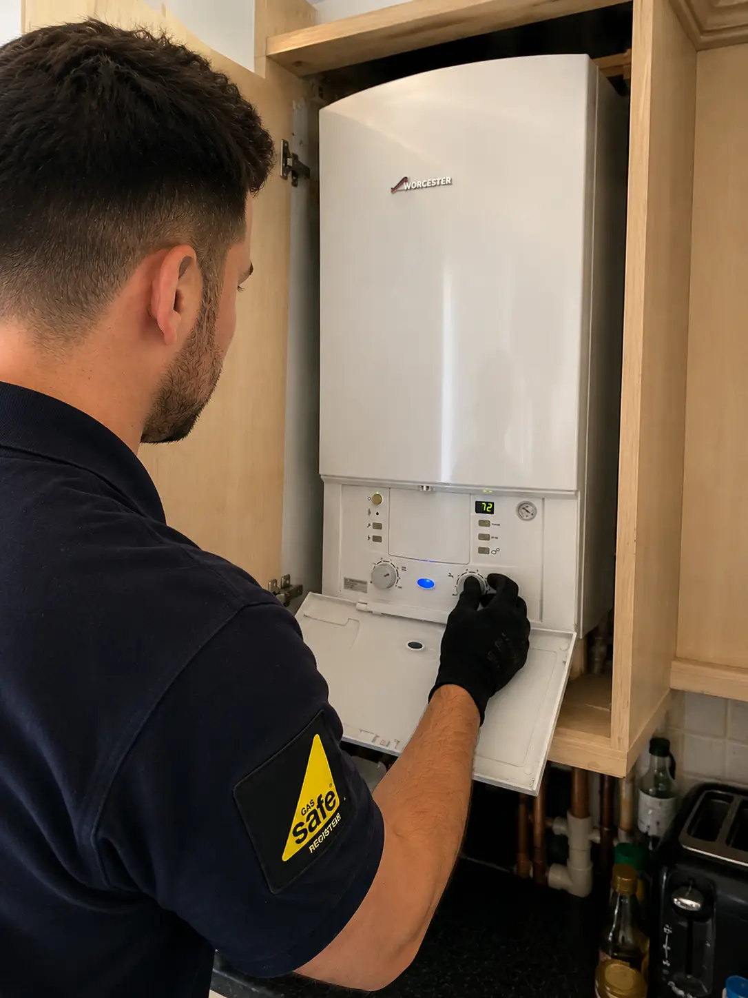 Boiler Repair Hackney Gas Safe registered engineer completing a boiler repair